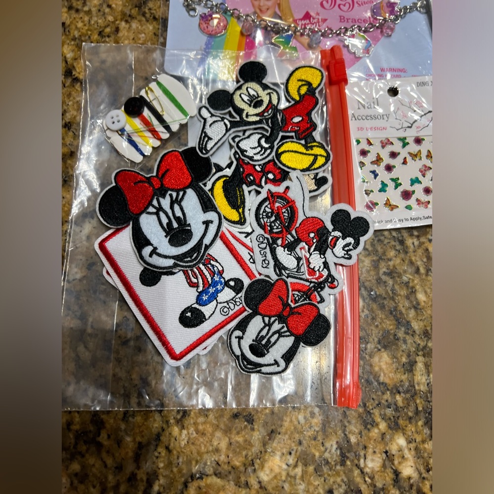 Mickey patches, Sanrio hairclifs .Jojos bracelets, nail accesory.